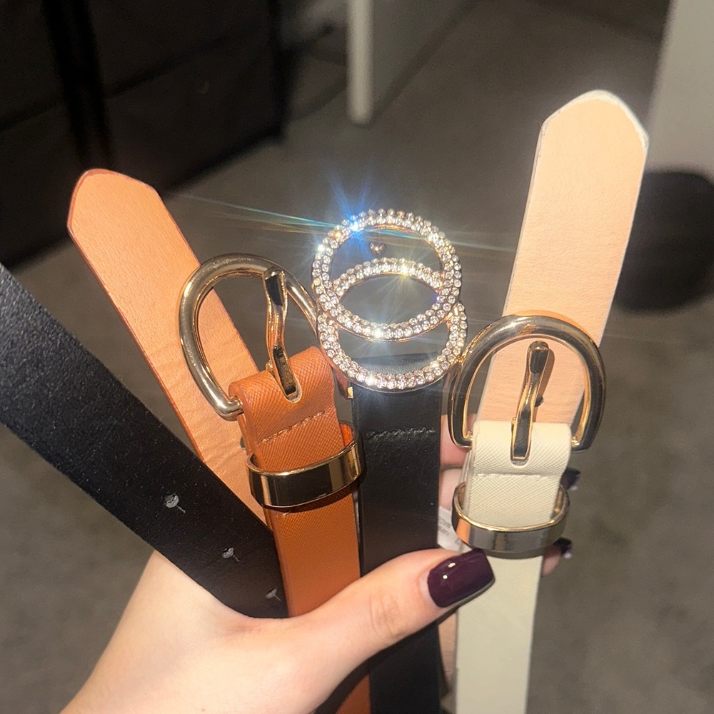 Elegant Black, Tan, and Cream Belt Set with Gold Buckles